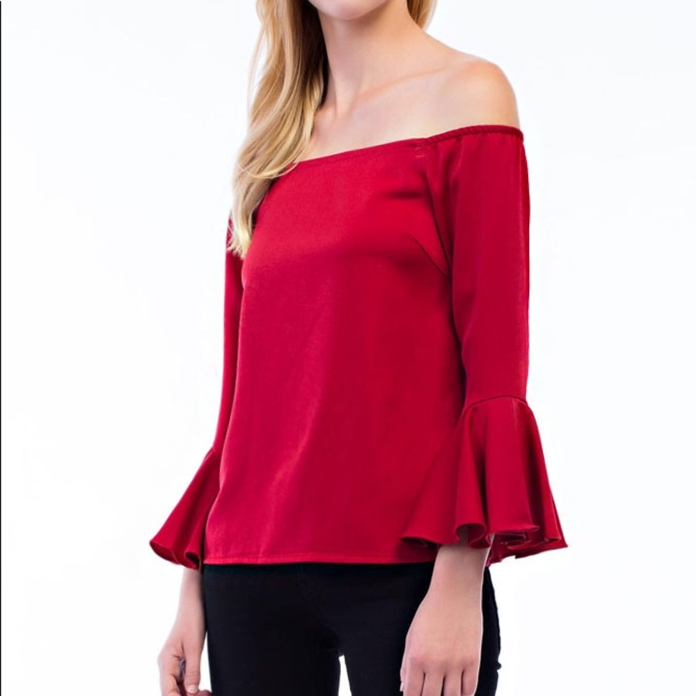 Off shoulder burgundy top bell sleeves.